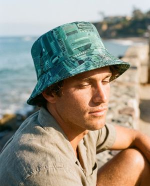 Transformative Teal Lehua bucket hats