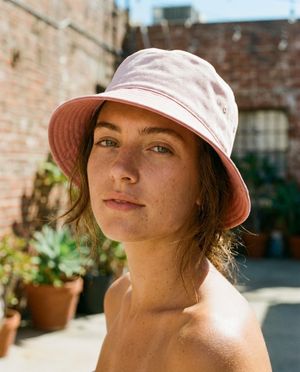 Dusty Rose Racing Green bucket hats