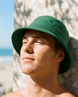 Runway Emerald Raisin & Mauve bucket hats