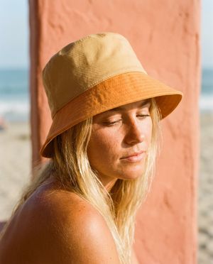 Amber Haze Coral Reef bucket hats