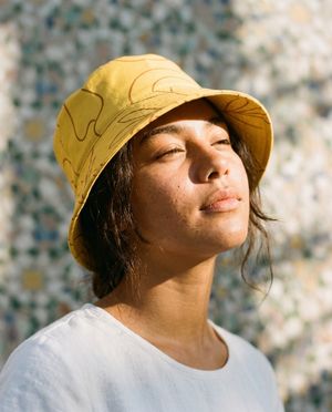 Lemon Yellow Elysium bucket hats
