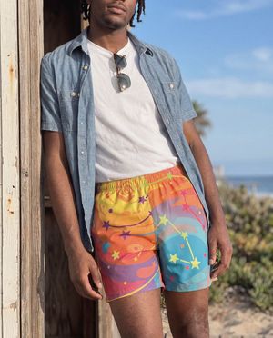 Citrus Orange Astral men's swim trunks