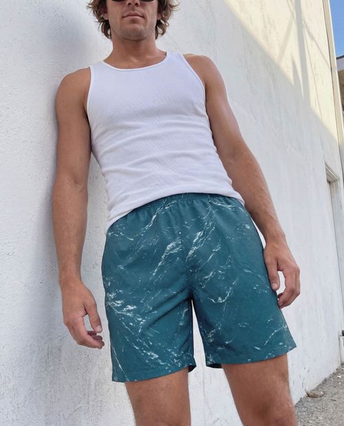 Turquoise Eclipse Men's Swim Trunks