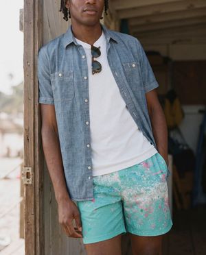 Neon Turquoise Pixelate men's swim trunks